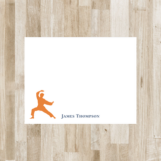 Personalized karate flat notecard with orange karate boy and navy name