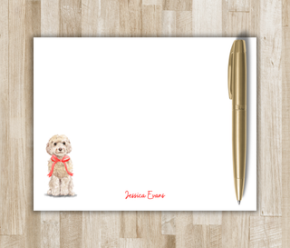 Personalized flat notecard with watercolor doodle wearing a red bow and red script name
